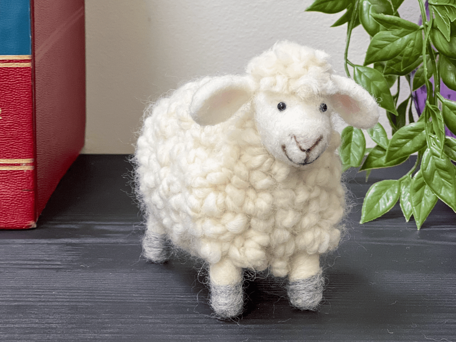 White needle felted sheep with white curly wool