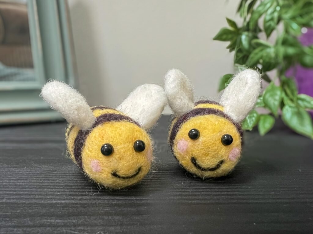 two cute kawaii style needled felted bees